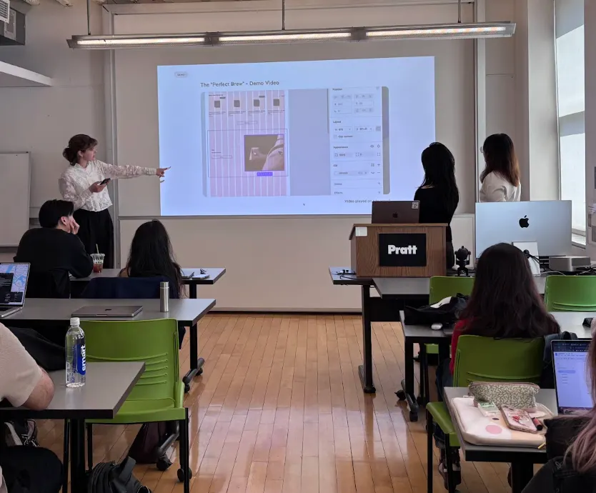 Claire presenting the Pour Over pitch deck to a classroom at Pratt Institute